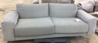 Gray Sofa, Cut on side arm rest