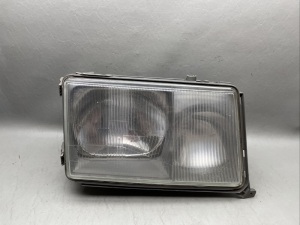 W124 early generation headlight Mercedes-Benz NOS OEM Drivers side headlight only