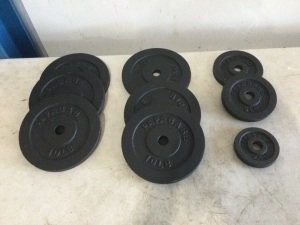 (6) 10-pound weights, (2) 5-pound weights, and (1) 2.5-pound weight