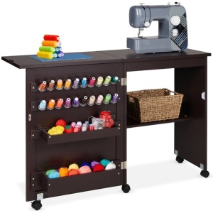 Folding Sewing Table Multipurpose Craft Station & Side Table w/ Wheels Open Dimensions: 46"(L) x 14.75"(W) x 30.5"(H) Closed Dimensions: 23"(L) x 14.75"(W) x 31"(H) Peg Board: 20"(L) Door Bins: 15.5"(L) x 3.75"(W) x 2"(H) Inner Shelf: 20.75"(L) Shelf Spac