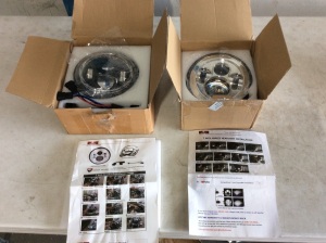 Lot of (2) Motorcycle Head Lights - E-Comm Return, Unknown Condition 