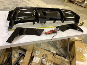 Carbon fiber bumper with light for unknown vehicle