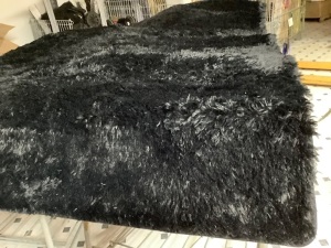 Black area rug with non skid backing- 112" x 75"