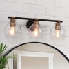 Zevni 22 in. 3-Light Modern Brass Vanity Light, Globe Seeded Glass 