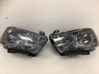 Headlights for a 2011-14 Dodge Charger, E-Comm Return