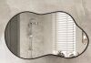 Irregular Black Aluminum Alloy Framed Wall Mirror, 46 in. W x 26 in. H