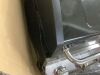 Nexgrill 4-Burner Propane Gas Grill. - Dented, Lid Missing Hinge Screw - 4