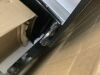 Nexgrill 4-Burner Propane Gas Grill. - Dented, Lid Missing Hinge Screw - 7