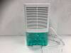 Household Dehumidifier, Powers Up, E-Commerce Return
