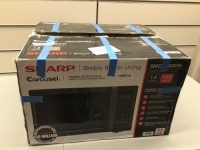 Sharp 1.4-cu ft 1100-Watt Countertop Microwave (Black Stainless Steel). Broken Handle. E-Commerce Return. Tested