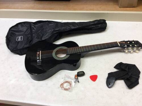 Black Guitar With Strings, Tuner, Pick, Strap, and Case. Some Damage. E-Commerce Return. See Pictures