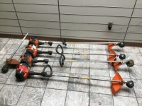 Lot of (4) Husqvarna Gas Trimmers, and (1) Head. Untested Store Returns