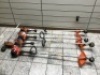 Lot of (4) Husqvarna Gas Trimmers, and (1) Head. Untested Store Returns