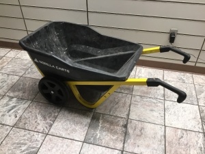 Gorilla Carts Wheelbarrow. Appears New w/ Minor Damage (Cracked Tub & Missing Bolt)