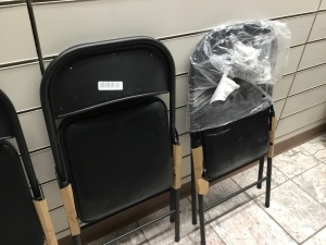 Lot of (3) Black Metal Folding Chairs w/ Padded Seat Cushion. Appear New w/ Minor Cosmetic Damage. 