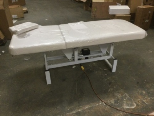 Single&nbsp;Motor Electric Exam/Spa/Massage Table. Works. New with Cut in Upholstery. SEE PICTURES