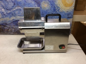 Commercial Meat Tenderizer. Powers On. Some Teeth are Bent. Needs Replacement Blades