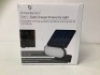 2-in-1 Solar Charger & Security Light, Powers Up, New