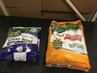 Bag of Scotts Grass Seed, and a Bag of Scotts Turf Builder. Small Hole in Both Bags