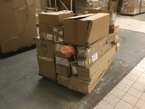 Pallet of New Auto Parts. Includes Hubs, Driveshafts, Lights, and More