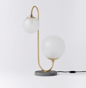 A west elm exclusive, we worked with New York City-based design studio Pelle to create this table lamp. You'lllove the soft light its two salt-blasted glass globes giveoff., Like New, Retail - $249