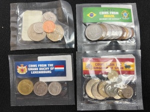 Lot of (4) Packs of Coins from Around the World