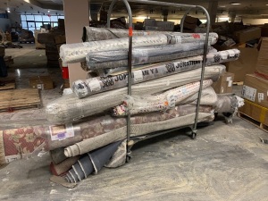 Lot of Area Rugs. SEE PICTURES. Many are Brand New. Huge Retail Value!! Metal Cart NOT Included